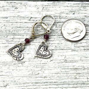 172. Sterling silver hammered heart amethyst crystal earrings